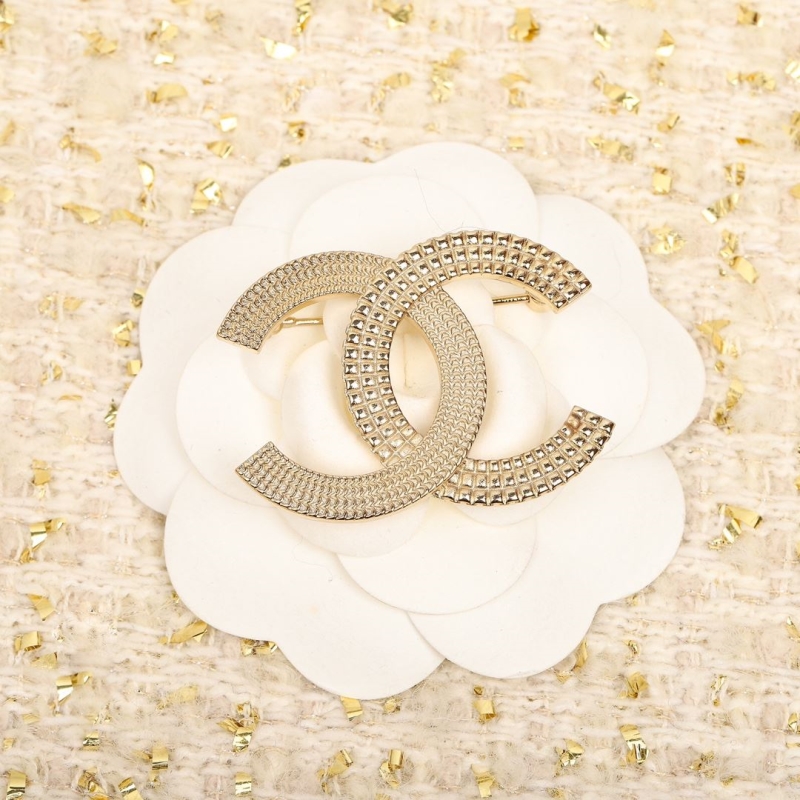 Ch**el brooches